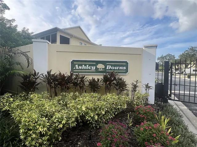 a sign broad in front of house