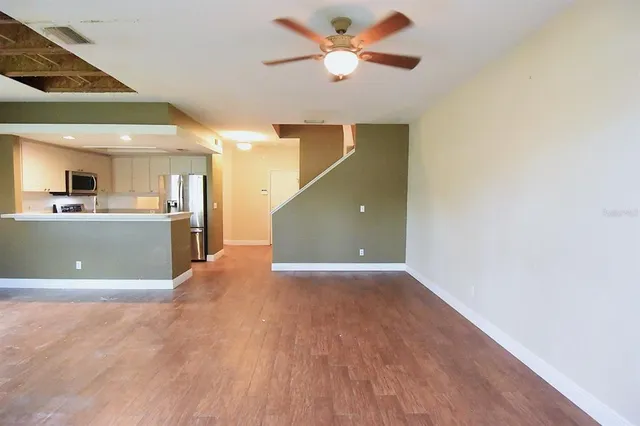a view of a kitchen with a sink and a kitchen