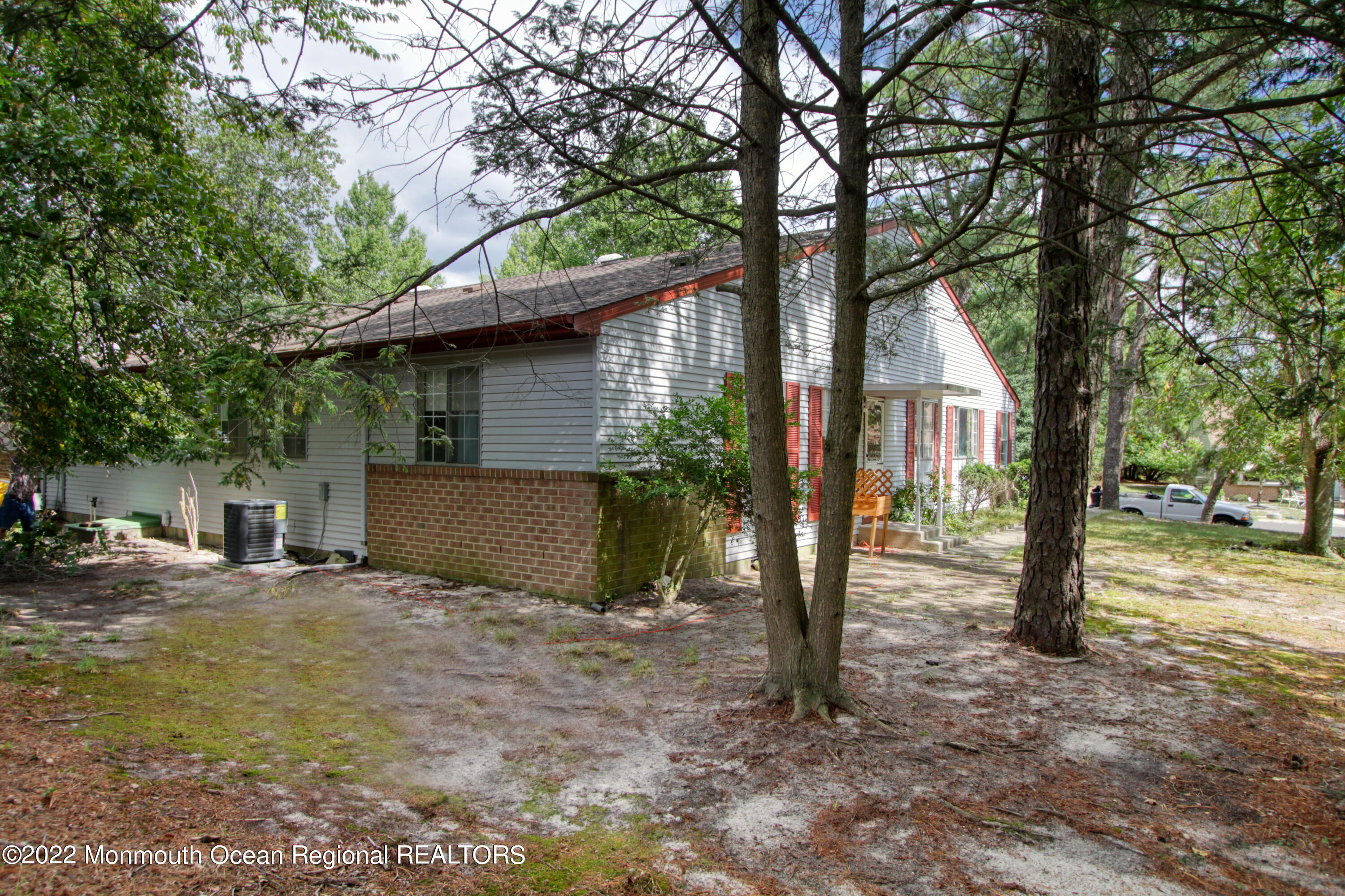 8A Fallbrook Street, Unit A Whiting, NJ 08759 - Photo 18 of 18 a view of a house with a yard and tree