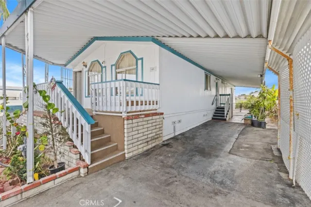 a view of front door with stairs