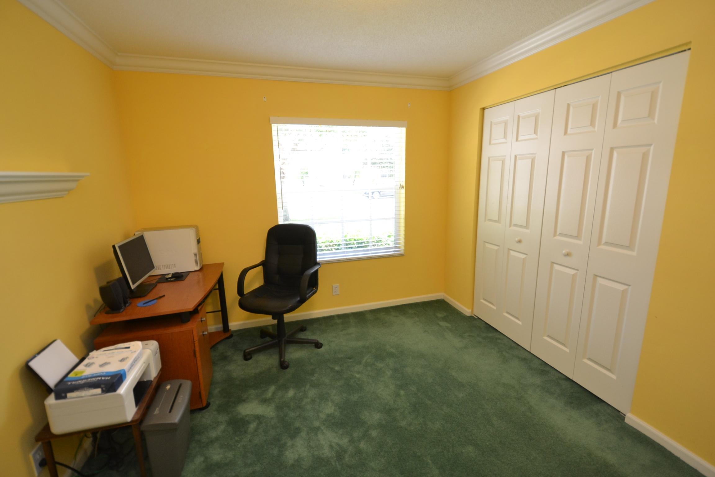 112 West Lee Road Delray Beach, FL 33445 - Photo 26 of 30 a view of a workspace with furniture and a window