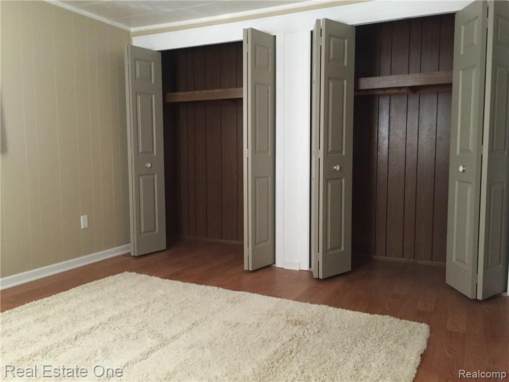 679 West Baker Road Highland, MI 48357 - Photo 14 of 39 Master Bedroom