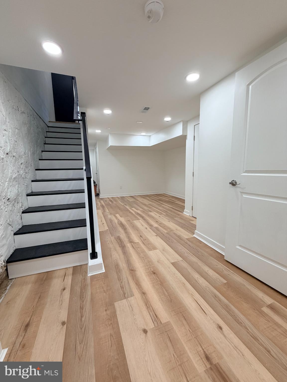 5436 Ridgewood Street Philadelphia, PA 19143 - Photo 17 of 30 a view of a hallway with stairs and a window