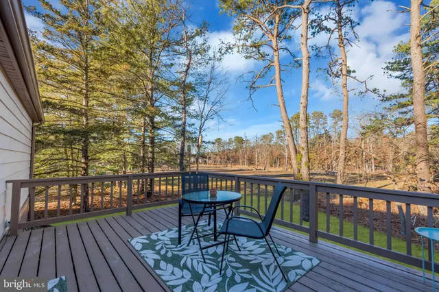 a view of a chairs on the roof deck