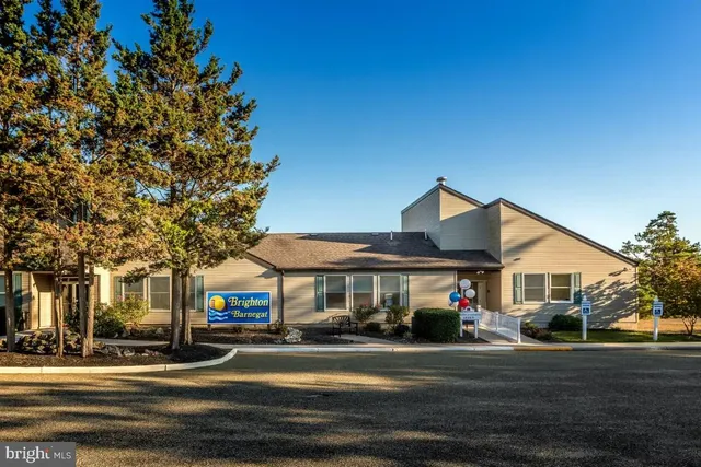 a front view of a building and a street