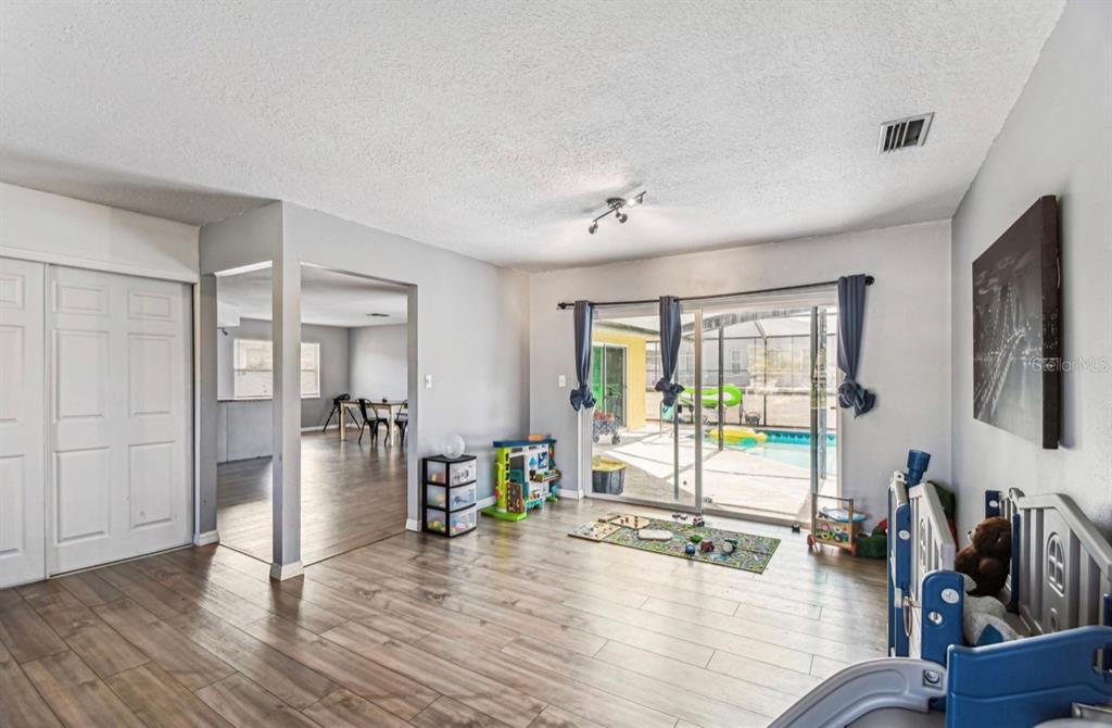 7112 Vista Way New Port Richey, FL 34653 - Photo 12 of 54 a view of a living room