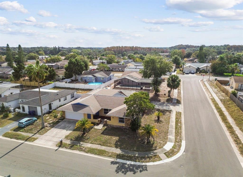 7112 Vista Way New Port Richey, FL 34653 - Photo 51 of 54 a view of a house with a swimming pool