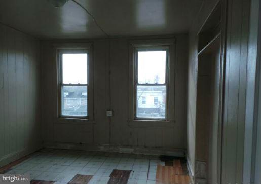 3601 Old York Road Baltimore, MD 21218 - Photo 4 of 11 a view of an empty room with a window