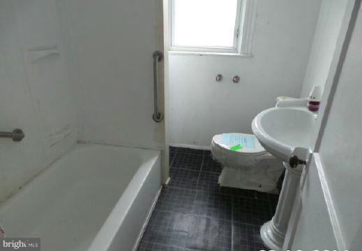 3601 Old York Road Baltimore, MD 21218 - Photo 5 of 11 a bathroom with a sink and a toilet
