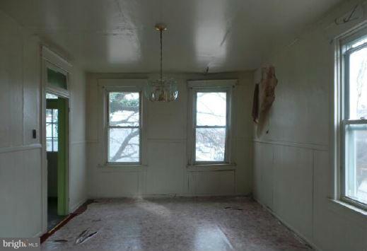 3601 Old York Road Baltimore, MD 21218 - Photo 7 of 11 an empty room with windows