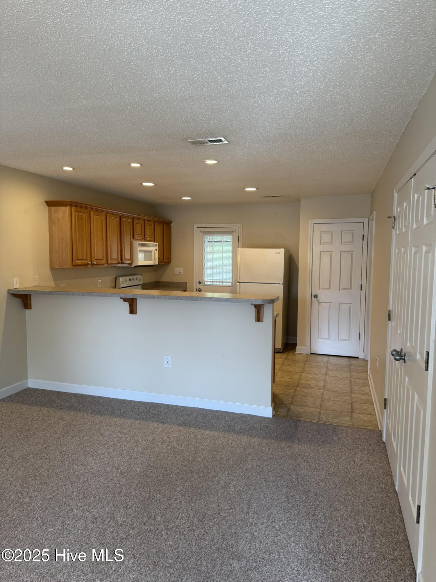 1003 High Point Avenue Southwest, Unit 3 Calabash, NC 28467 - Photo 3 of 12 IMG_7307