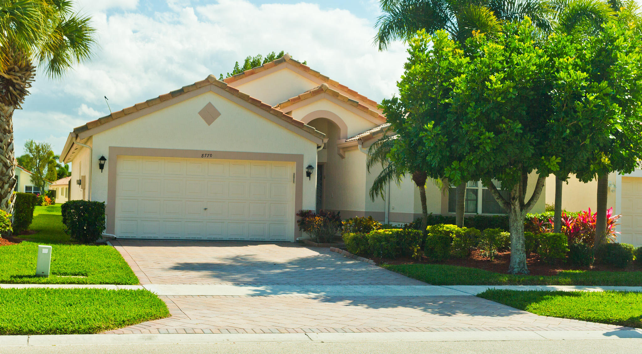 8770 Chunnel Drive Boca Raton, FL 33433 - Photo 1 of 17 Front of Home