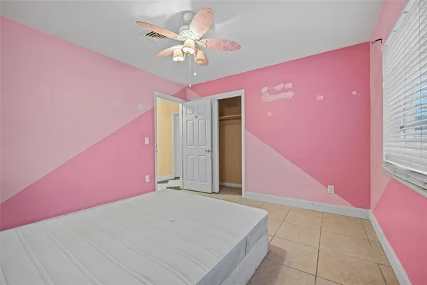 a bathroom with a shower and a sink