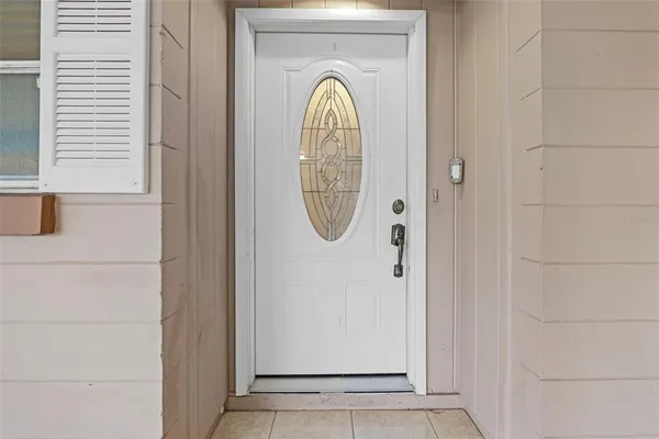 a front view of a house with large windows