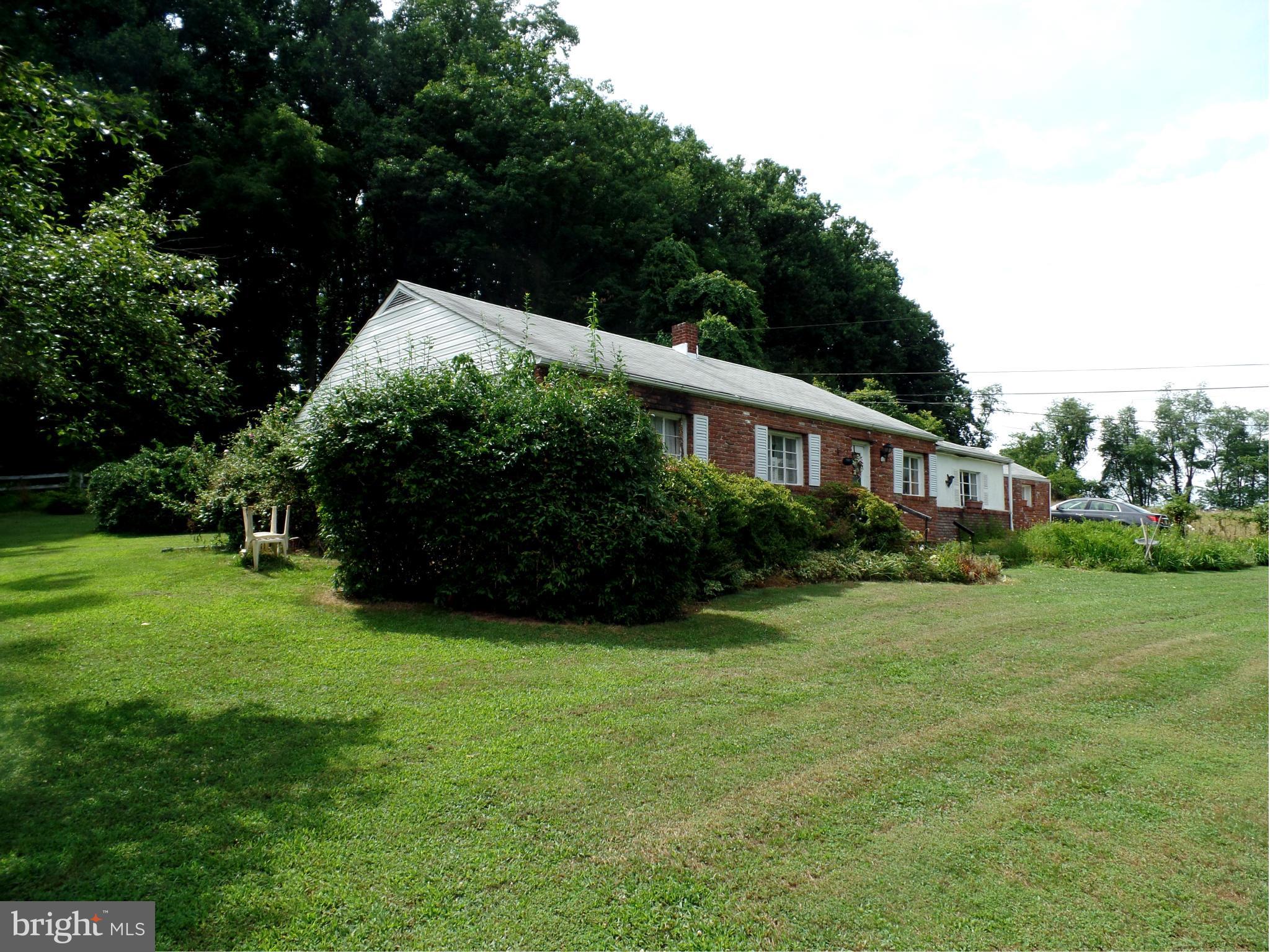 2938 Ridge Road Baltimore, MD 21244 - Photo 3 of 16 a view of a house with a backyard