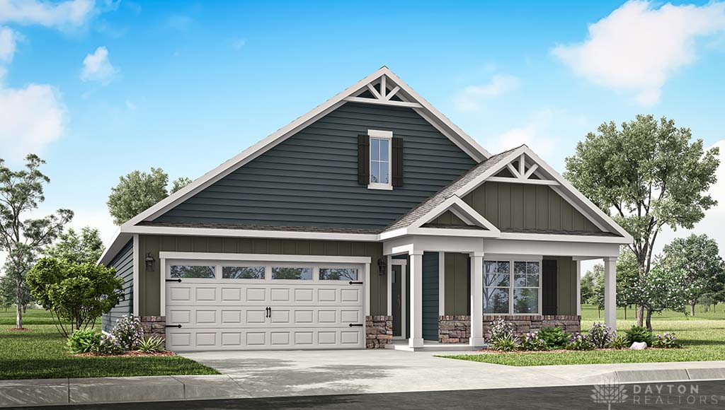 This charming home offers a perfect blend of comfort and style with its inviting porch and attached garage.