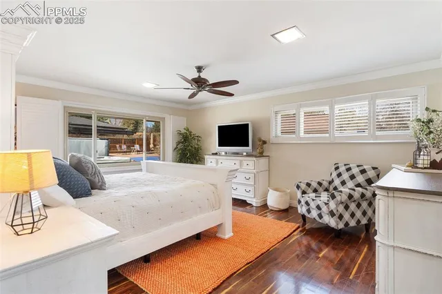 a living room with furniture fireplace and flat screen tv