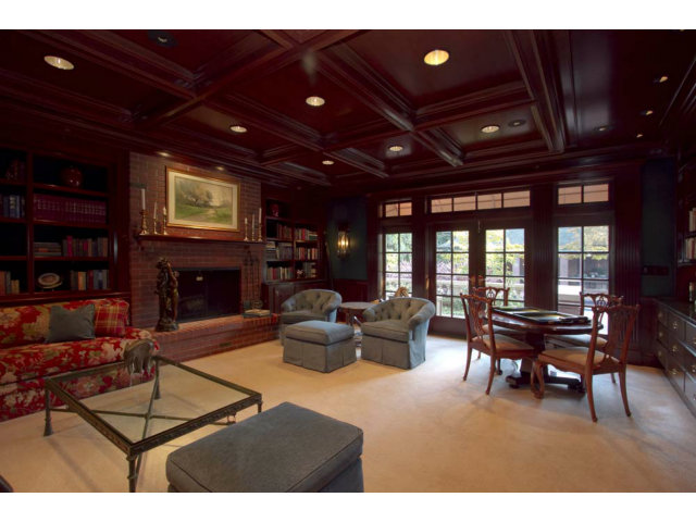 441 Roehampton Road Hillsborough, CA 94010 - Photo 6 of 10 a living room with fireplace furniture and a flat screen tv