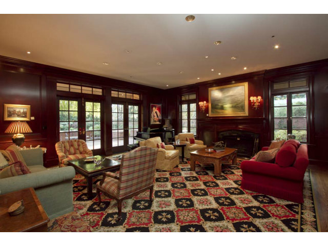 441 Roehampton Road Hillsborough, CA 94010 - Photo 7 of 10 a living room with furniture a floor to ceiling window and flat screen tv