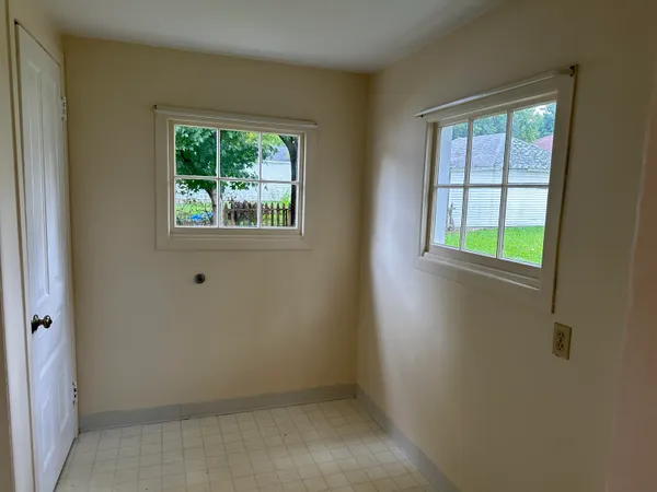 a kitchen with stainless steel appliances a sink and a refrigerator