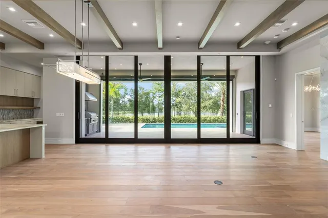 a view of hallway with a large window