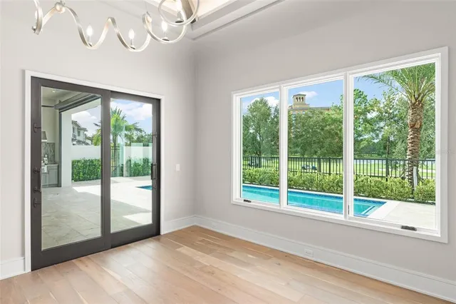 a view of a room with a large window