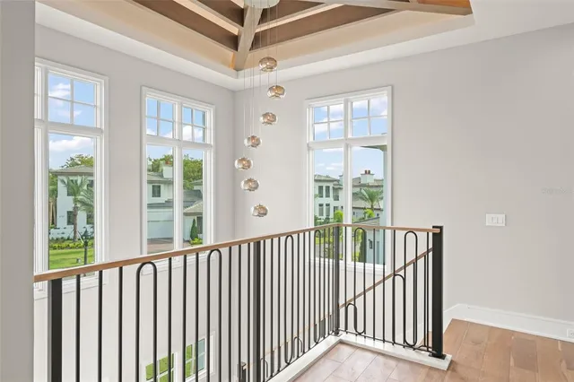 a view of a porch with wooden floor