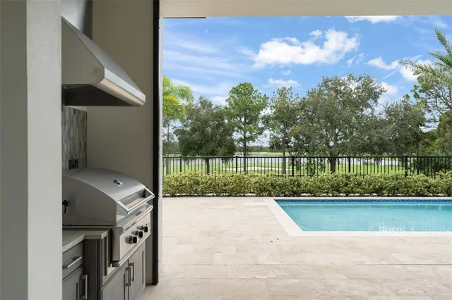 a view of a patio with a yard