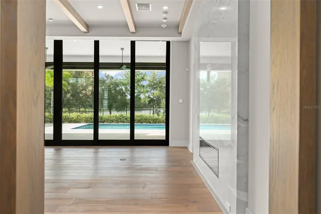 a view of an empty room and window