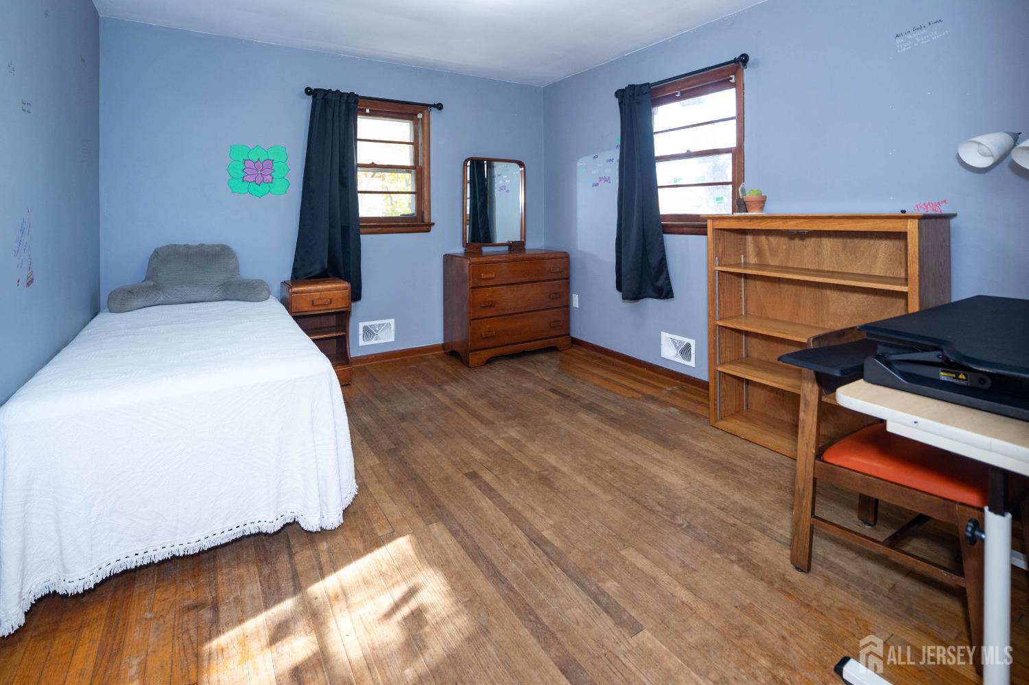 900 River Road Piscataway, NJ 08854 - Photo 21 of 37 a bedroom with a bed and a window