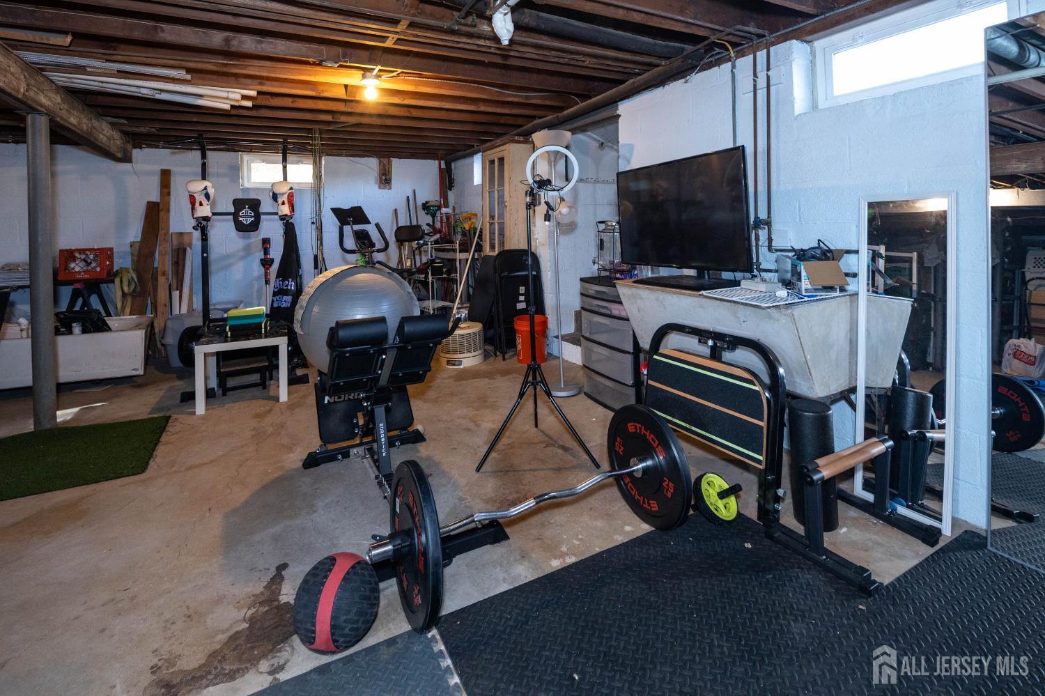900 River Road Piscataway, NJ 08854 - Photo 27 of 37 a view of a room with gym equipment