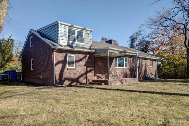 a front view of a house with yard