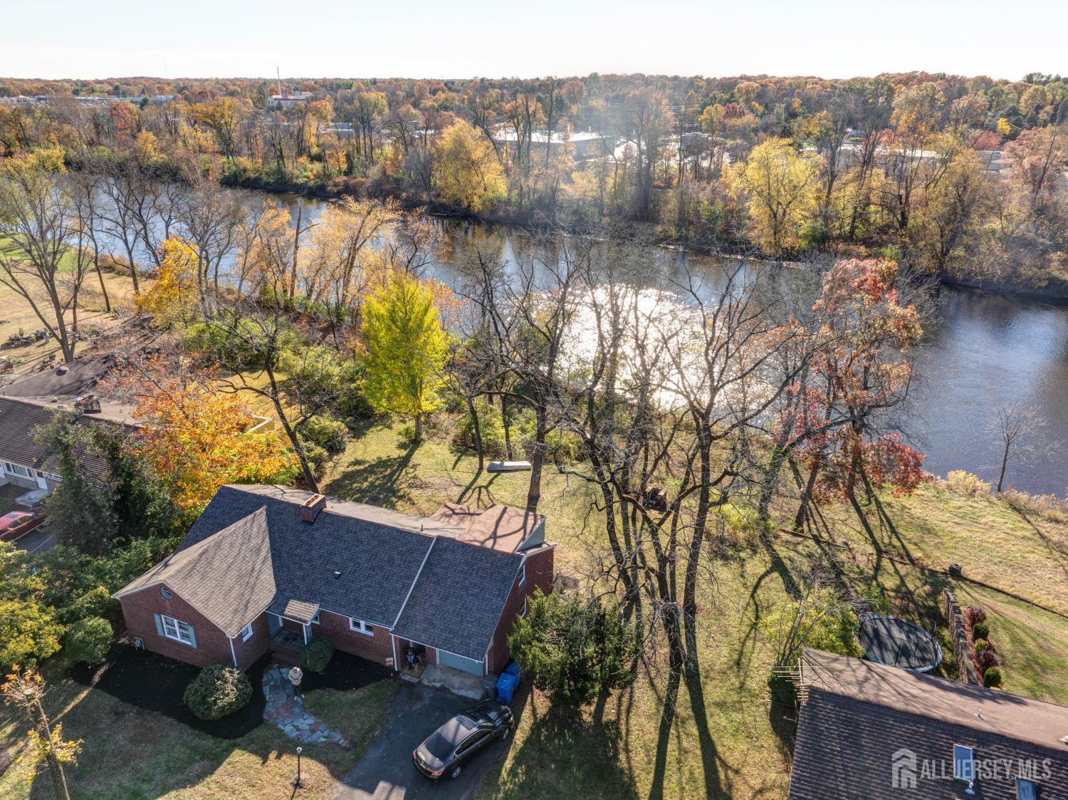 900 River Road Piscataway, NJ 08854 - Photo 9 of 37 a view of a lake with a mountain in the background