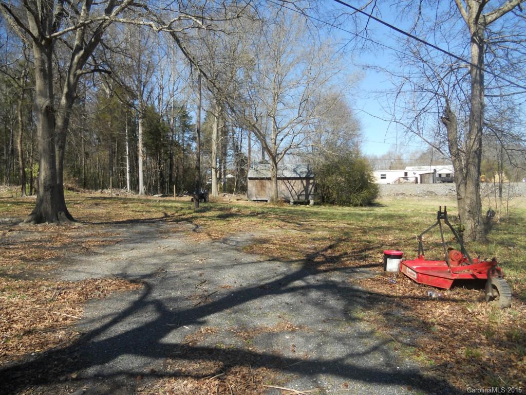 4771 Pottery Road Catawba, SC 29704 - Photo 6 of 18 a backyard of a house with trees
