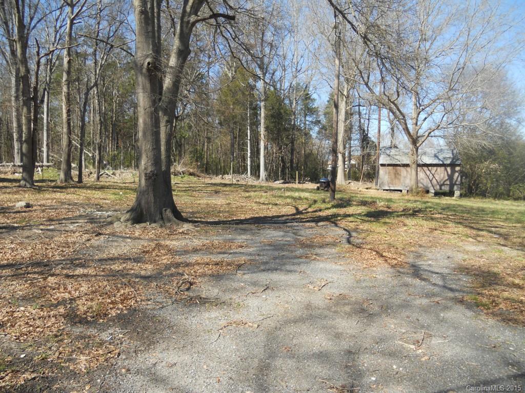 4771 Pottery Road Catawba, SC 29704 - Photo 7 of 18 a view of a yard with trees