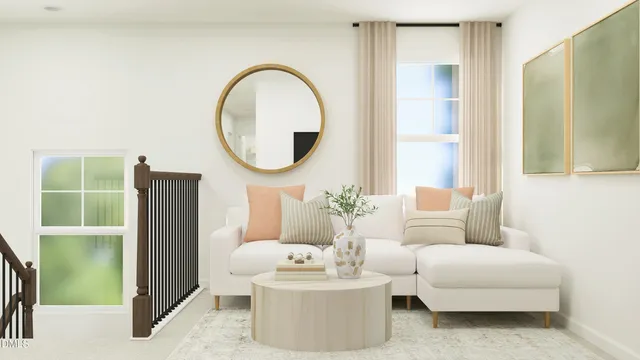 a living room with furniture a mirror and a potted plant