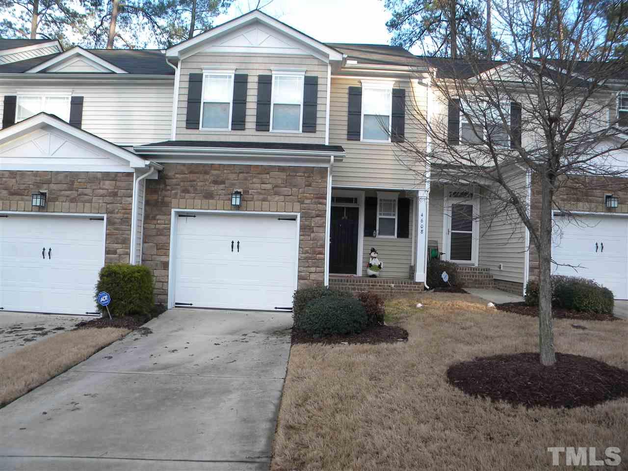 4608 Altha Street Raleigh, NC 27606 - Photo 1 of 12 a front view of a house with garden