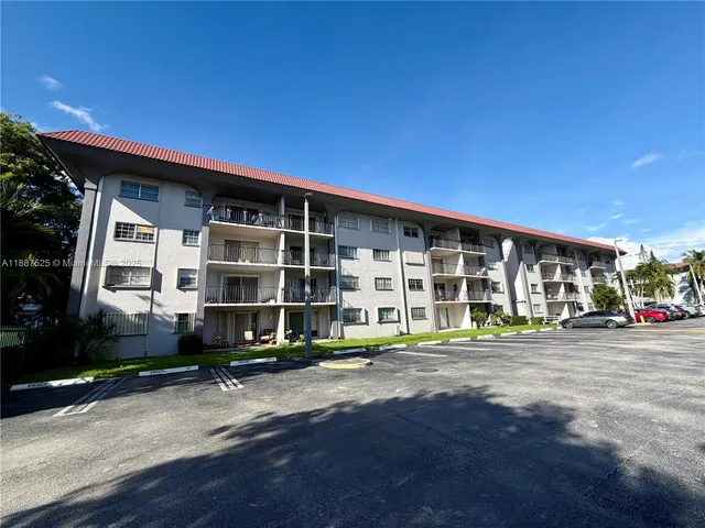 a front view of a building with a street
