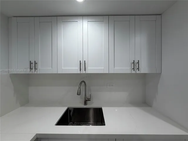 a kitchen with a sink