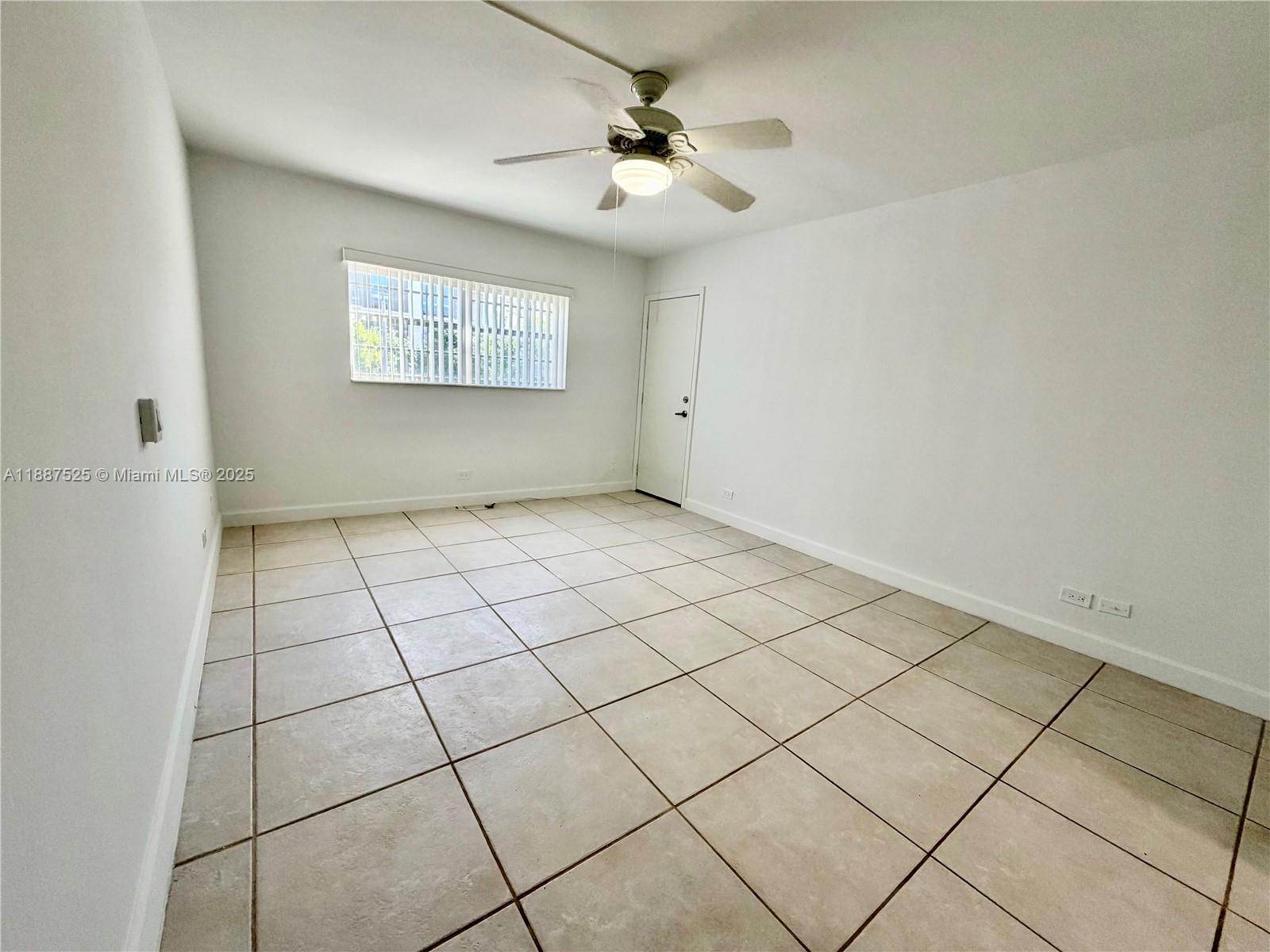 8101 Southwest 72nd Avenue, Unit 219W Miami, FL 33143 - Photo 23 of 30 a view of an empty room and window