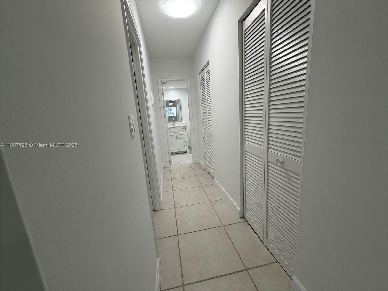 8101 Southwest 72nd Avenue, Unit 219W Miami, FL 33143 - Photo 24 of 30 a view of a hallway