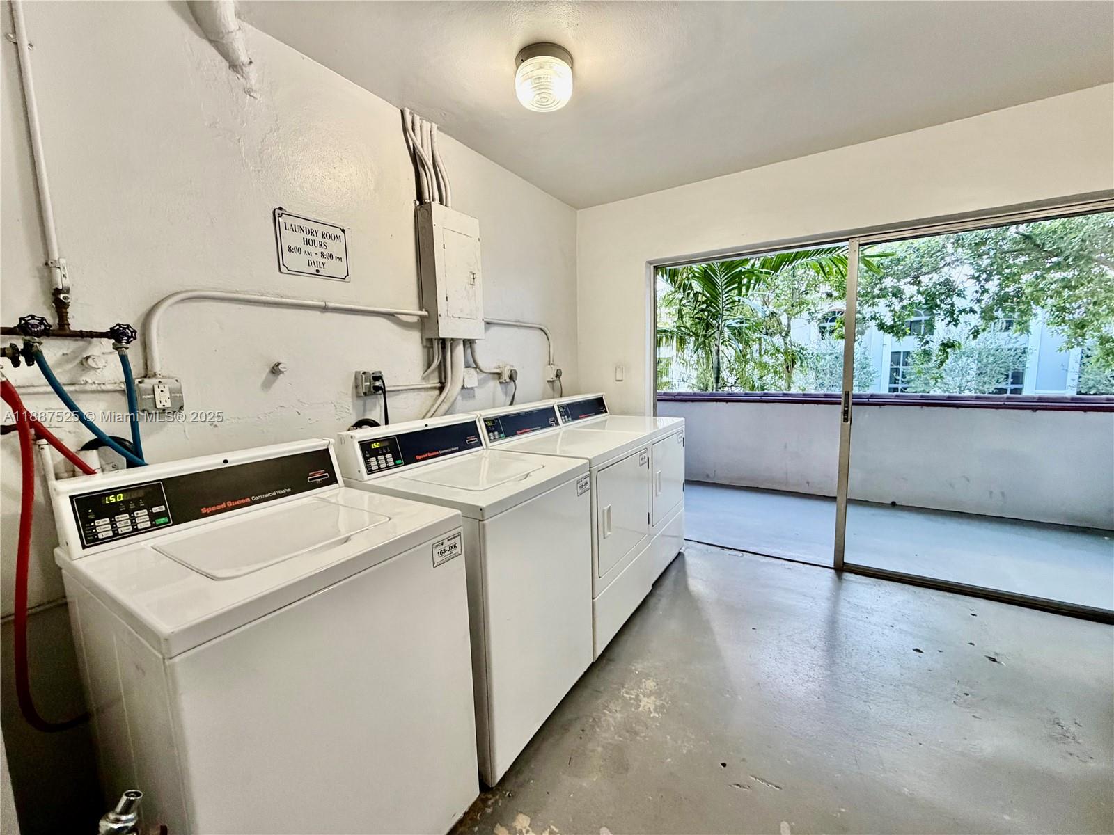 8101 Southwest 72nd Avenue, Unit 219W Miami, FL 33143 - Photo 8 of 30 a utility room with dryer and washer