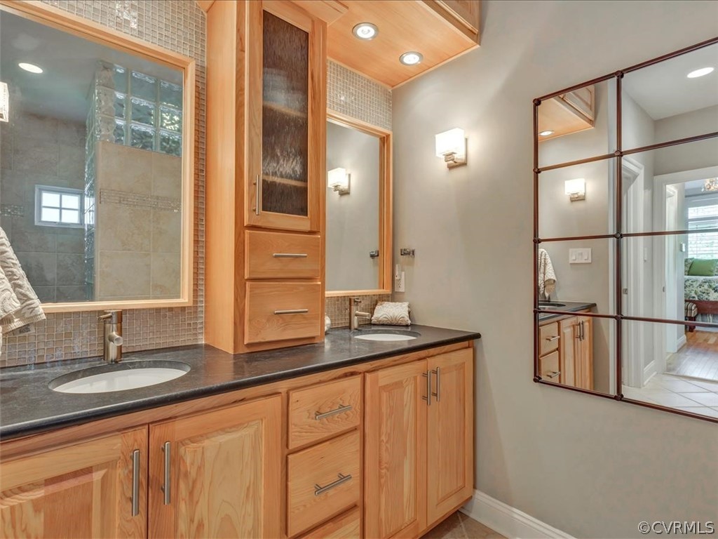 2366 Bel Crest Circle Midlothian, VA 23113 - Photo 15 of 37 a bathroom with a double vanity sink and a mirror