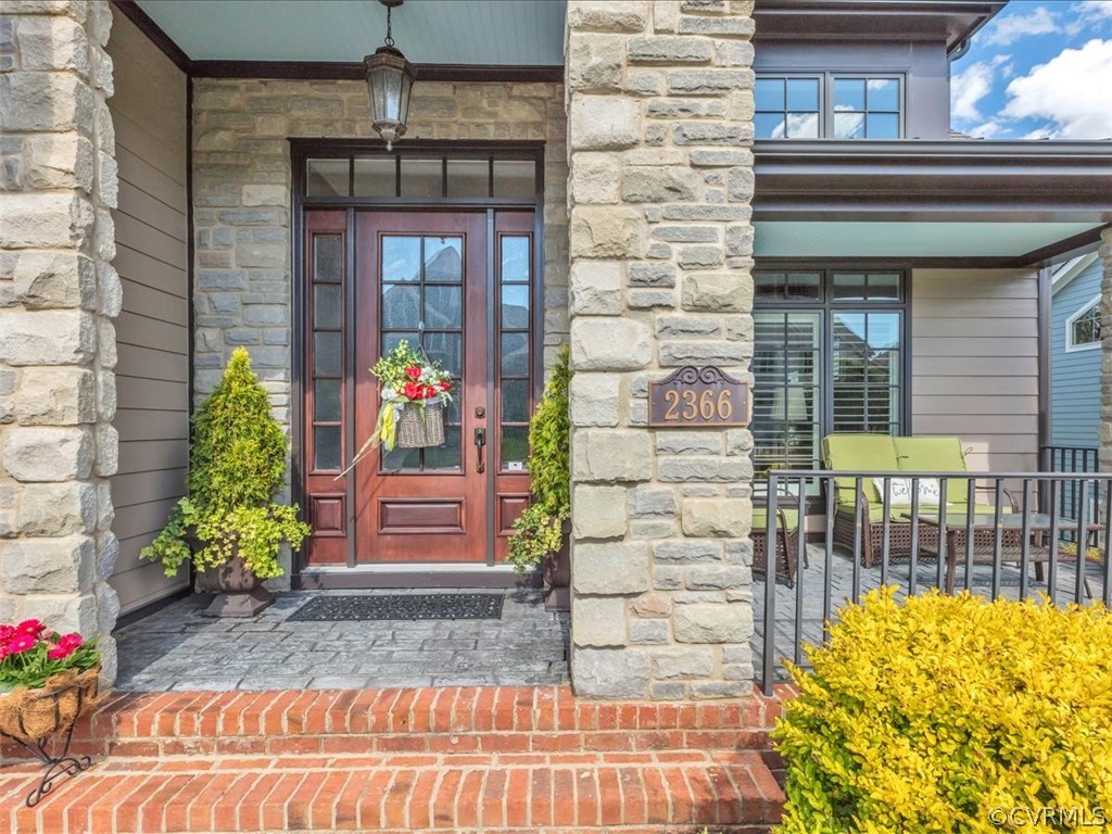 2366 Bel Crest Circle Midlothian, VA 23113 - Photo 2 of 37 a front view of a house with a porch