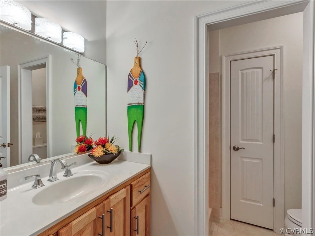 2366 Bel Crest Circle Midlothian, VA 23113 - Photo 28 of 37 a bathroom with a sink vanity and a mirror