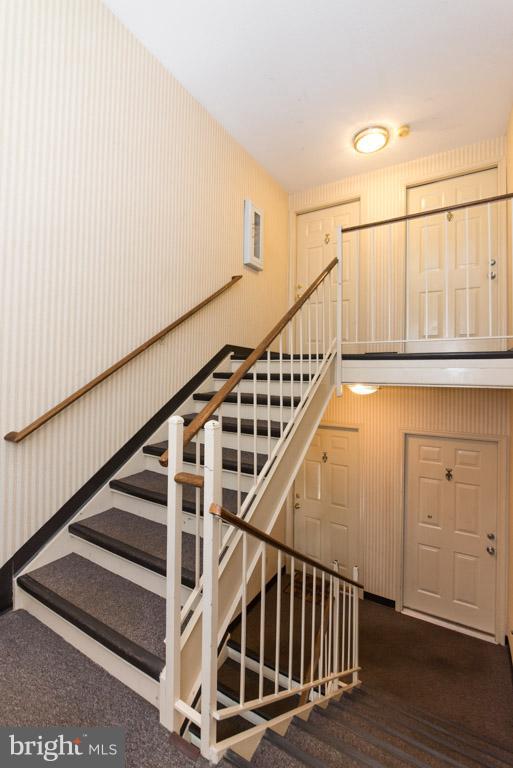 126 Fort Evans Road Southeast, Unit E Leesburg, VA 20175 - Photo 2 of 25 Interior bldg stairs