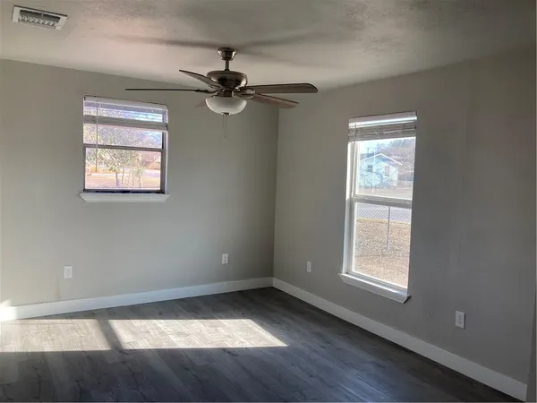 a view of an empty room and window