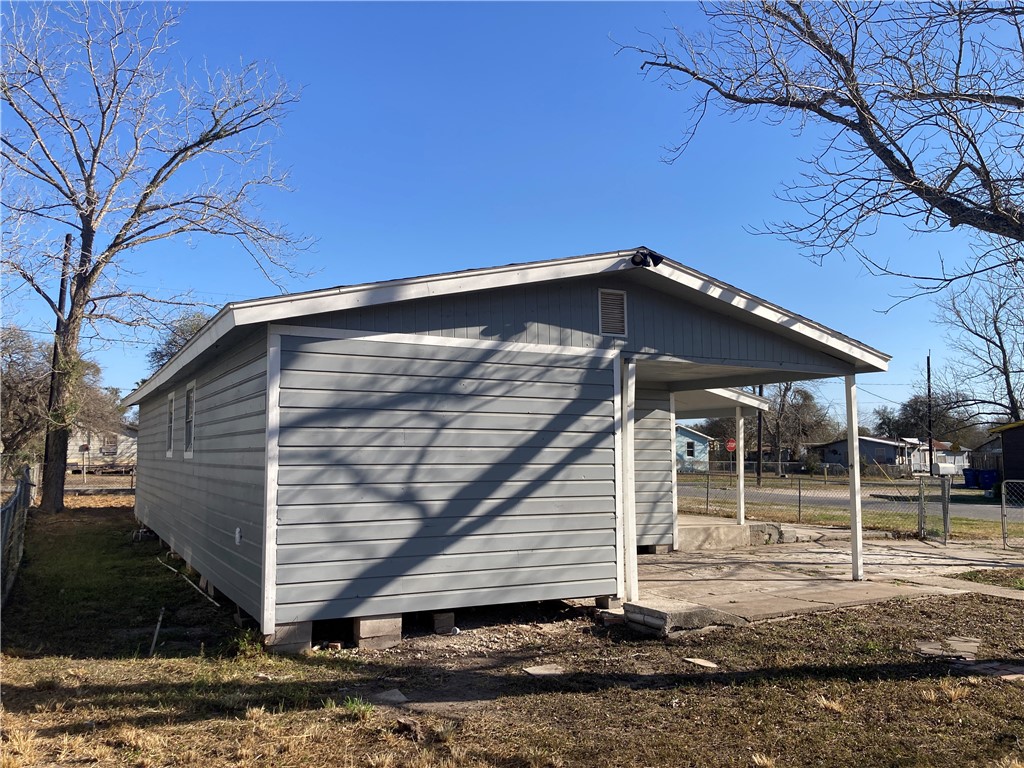 600 West St Marys Street Mathis, TX 78368 - Photo 10 of 11 a view of a house with a yard
