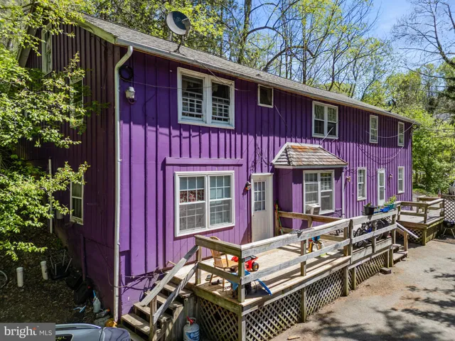 a view of a chairs and table in the patio