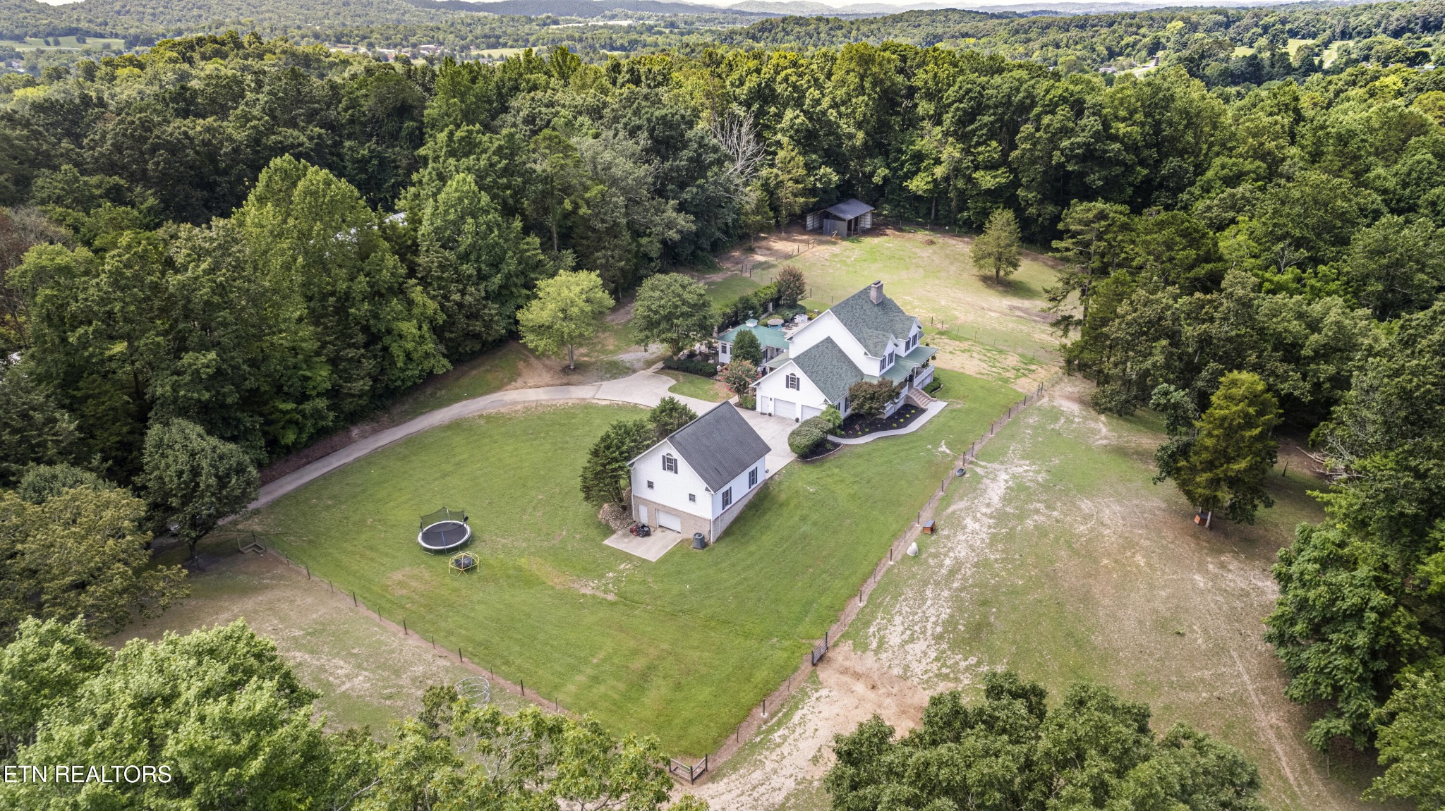 316 Red Hill Road Andersonville, TN 37705 - Photo 4 of 59 an aerial view of a house with a yard